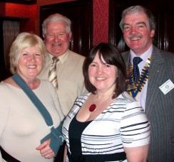 City High School teachers Jean Kee (left) and Sharon Crossley with club president Peter Gallivan (right) and vocational service chairman Roland Mold